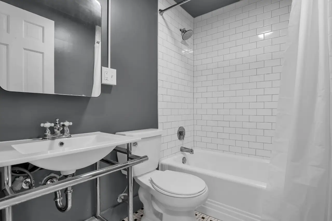 Newly renovated bathroom with modern fixtures and historic charm